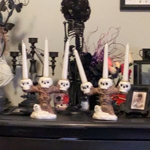 Skull candleholders set of two